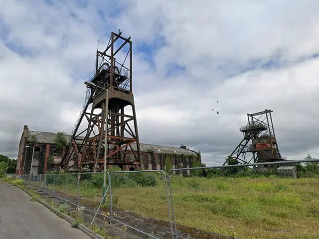 The former power hall and winding wheels at the Penallta Colliery site, pictured in June 2025