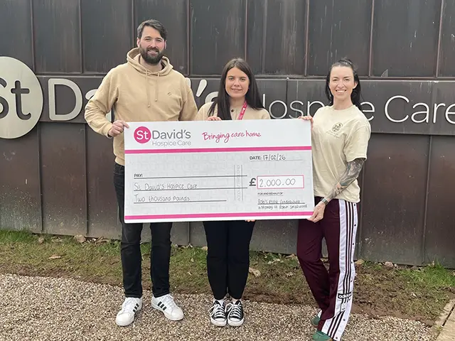 Rob's Roast founders Simon Smallwood and Steph Kelsey, and Abigail Hughes of St David's Hospice, centre