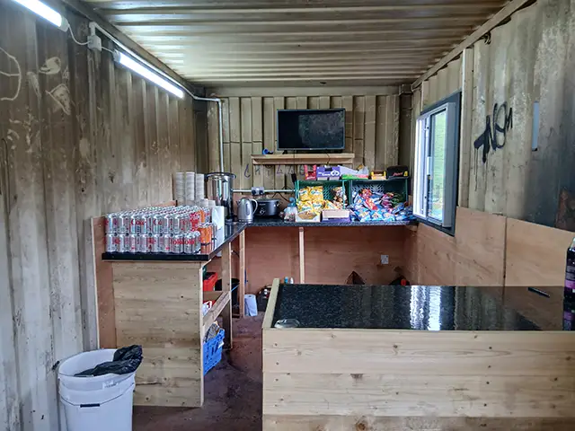 Aber Valley FC uses their storage container as a refreshments stall on match days