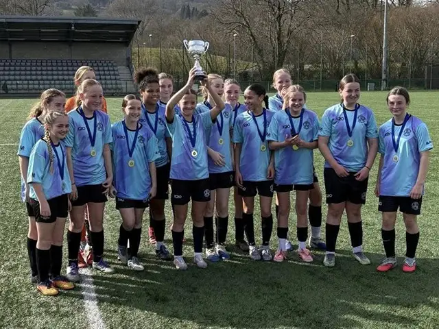 Islwyn High School U13s Girls celebrating their win