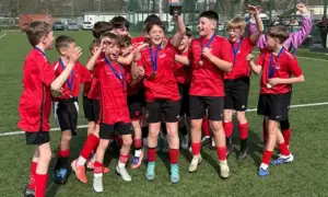 Pupils from Ysgol Gyfun Cwm Rhymni's Gellihaf campus celebrating their win in the Year 7 Boys category