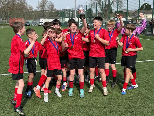 Pupils from Ysgol Gyfun Cwm Rhymni's Gellihaf campus celebrating their win in the Year 7 Boys category
