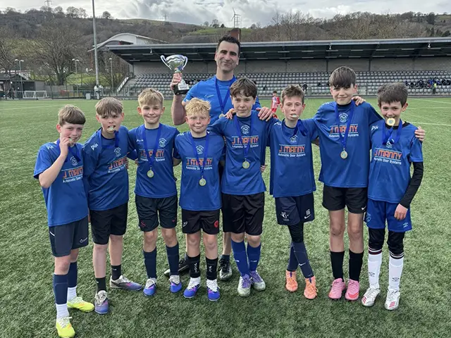 Ysgol Gymraeg Caerffili pupils celebrating their win