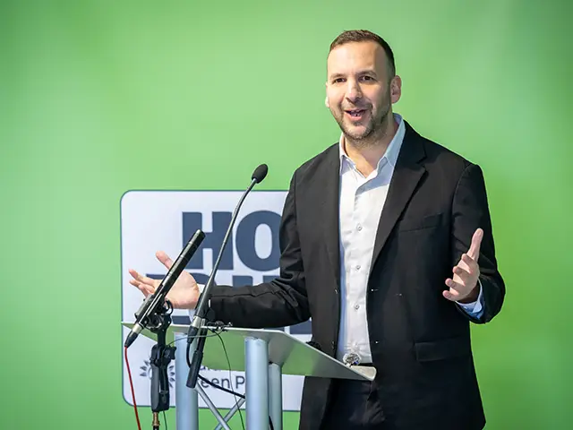 Green Party leader Zack Polanski speaking in Cardiff