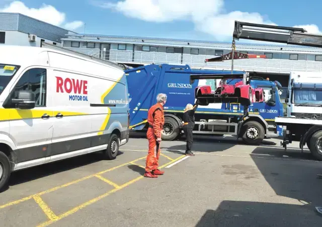 Graham Cole looks on as his BPS7 Prototype is hauled on to a recovery truck