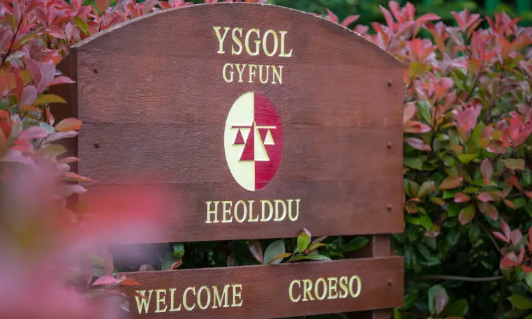 Heolddu Comprehensive School has been praised by Estyn