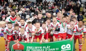 Rhymney Valley and Caerphilly Schools District Under-11s celebrating their victory at Rodney Parade
