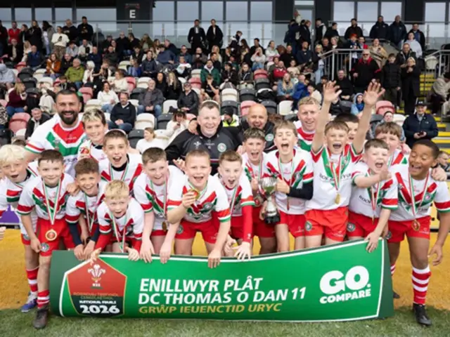 Rhymney Valley and Caerphilly Schools District Under-11s celebrating their victory at Rodney Parade