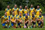 FC Tryzub players with community leader Yuliia Bond