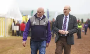 Review chair John Davies, left, and Welsh Government minister Llyr Gruffydd