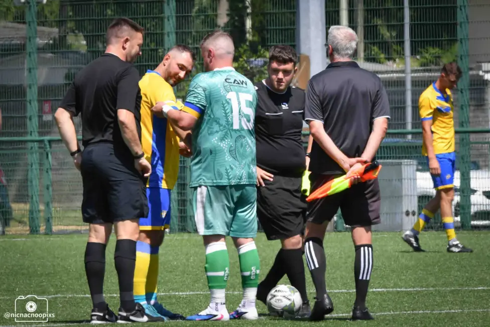 The players wore armbands with the Ukrainian flag on them