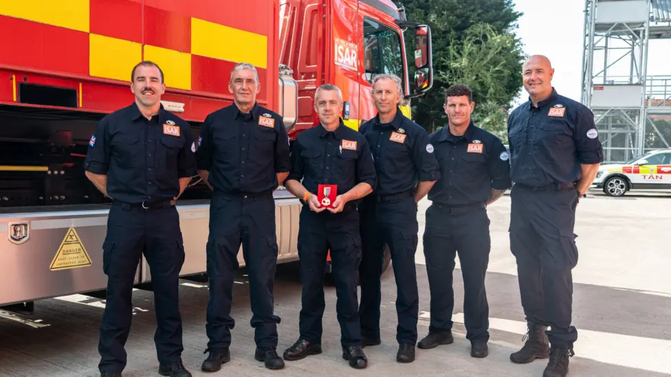 From left: crew managers Adrian Cummings and Robert Buckley, group manager Darren Cleaves, watch manager and chief drone pilot Kev Dite, watch manager Luke Davies, and watch manager Tristan Bowen