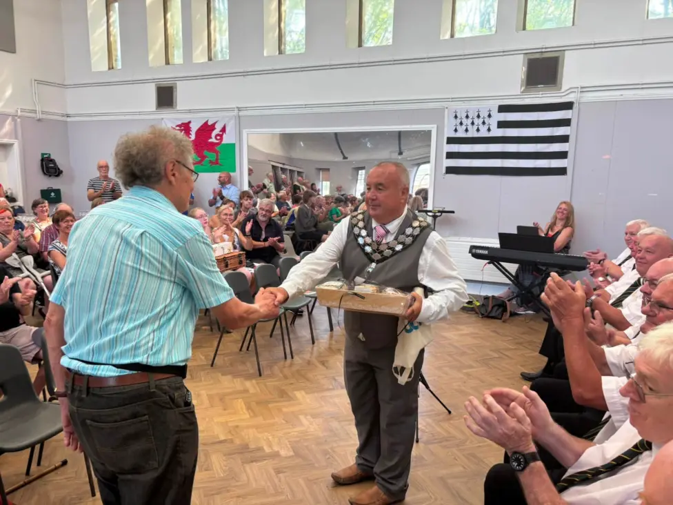 Caerphilly town mayor Mike Prew exchanging gifts with Jean-Jacques Monnier
