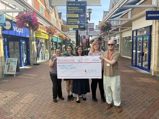Staff at Castle Court Shopping Centre have raised £1,001