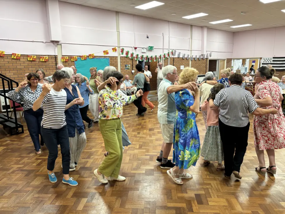 Twinning association members and Breton guests took part in traditional dancing at Llanbradach Community Centre