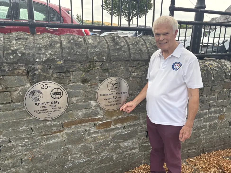 Llanbradach councillor Colin Mann at the newly-unveiled plaque in Llanbradach
