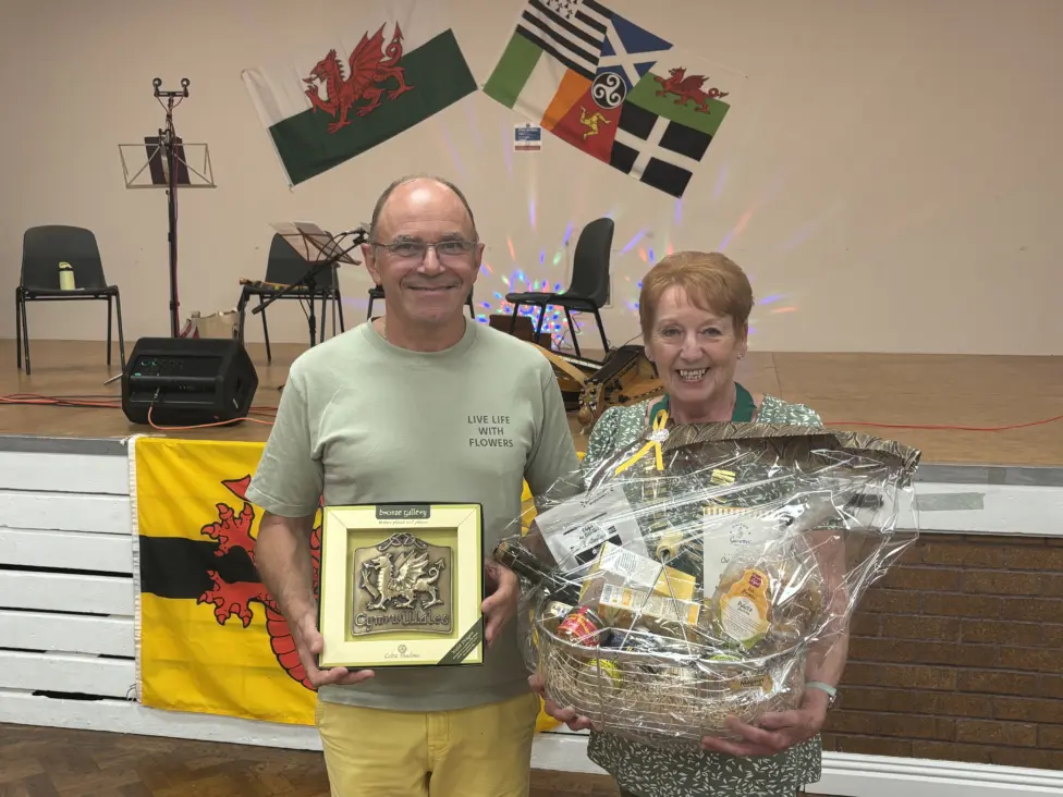 Gildas Nicolas and Llanbradach and Pwllypant Community Council chair Norma Cabble