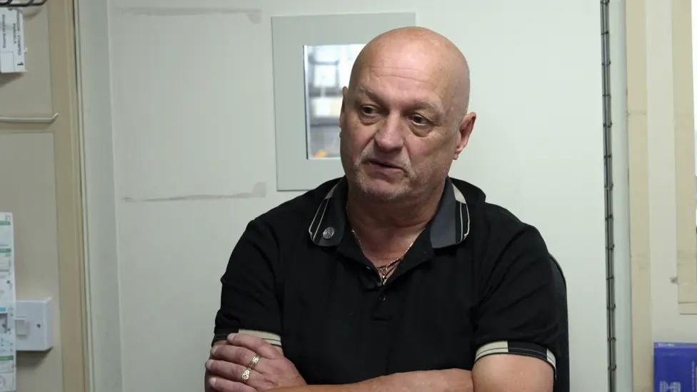 Steve Phillips, postmaster at Nelson Post Office