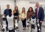 Enterprise minister Adam Price, right, during a visit to Newtown-based REECO Automation Ltd
