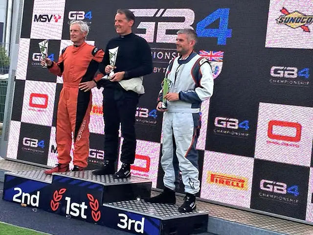 Graham Cole, left, on the podium at Silverstone