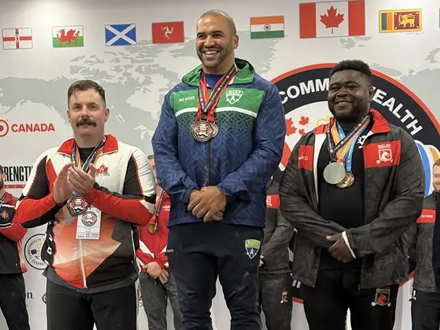 Olu Akanro, right, on the podium in Canada
